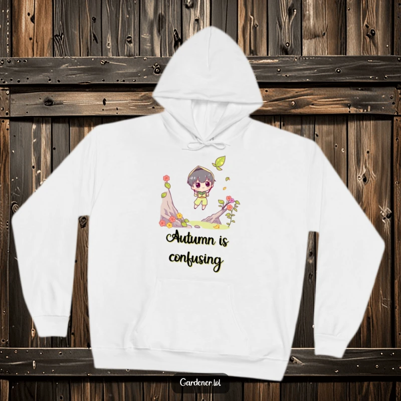 Funny hoodie with a character trying to catch a falling leaf using a butterfly net. Cozy and humorous funny gift.