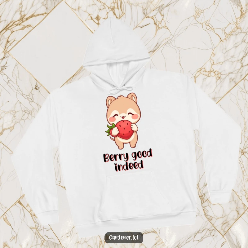 Funny hoodie depicting a cute animal character examining a plump, happy strawberry with absolute glee and delighted anticipation.
