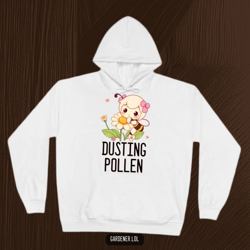 Funny hoodie depicting a character playfully pollinating a flower with a fluffy brush, offering warmth and artistic nature vibes.