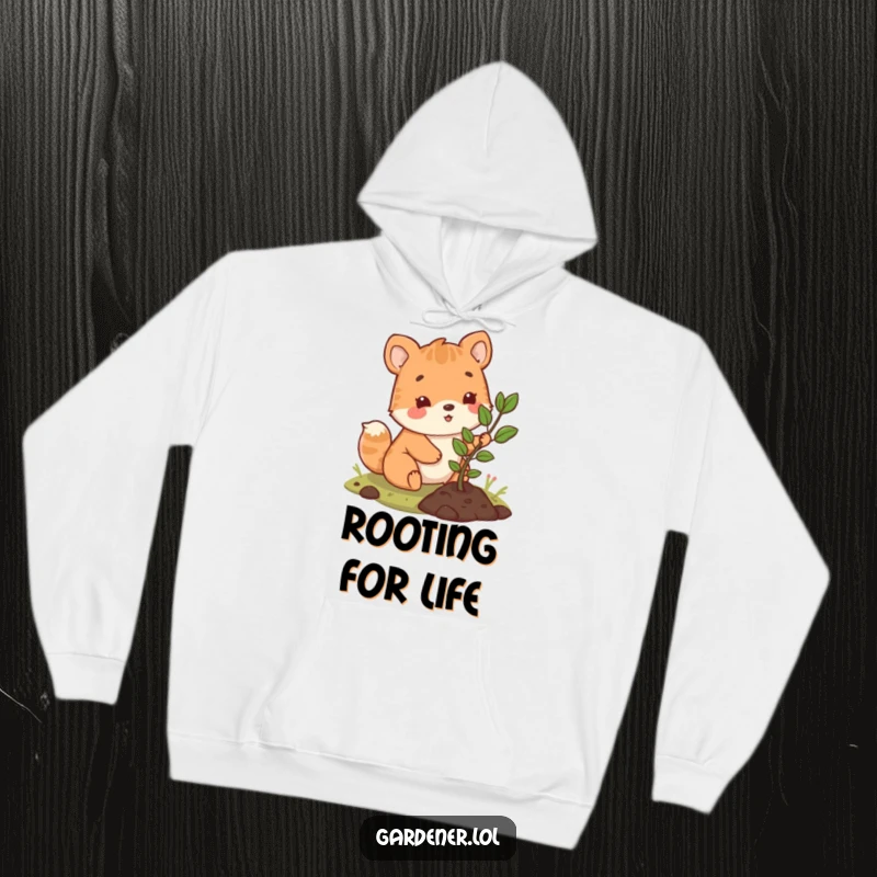 Funny hoodie showing a cute animal character happily planting a small sapling, symbolizing joy, growth, and environmental care.