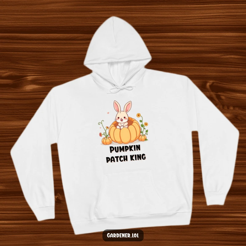 Funny Hoodie: A happy rabbit gardener leaping with glee into a huge, ripe pumpkin, ready for adventure.