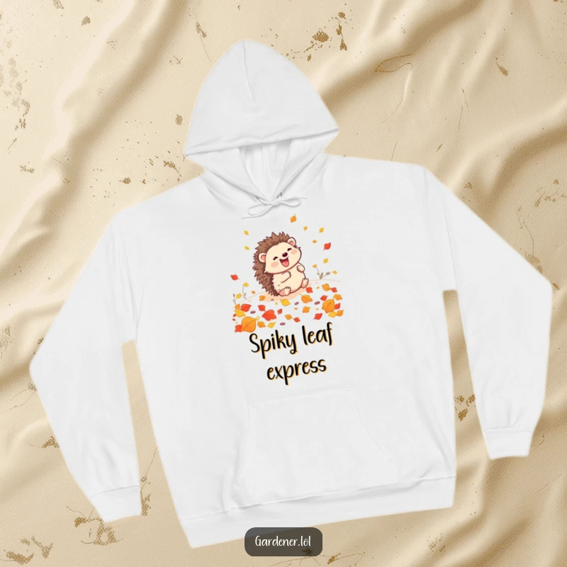 Funny Hedgehog Gardener Hoodie: A delighted hedgehog joyfully rolls through a pile of autumn leaves, perfect for cozy fun.