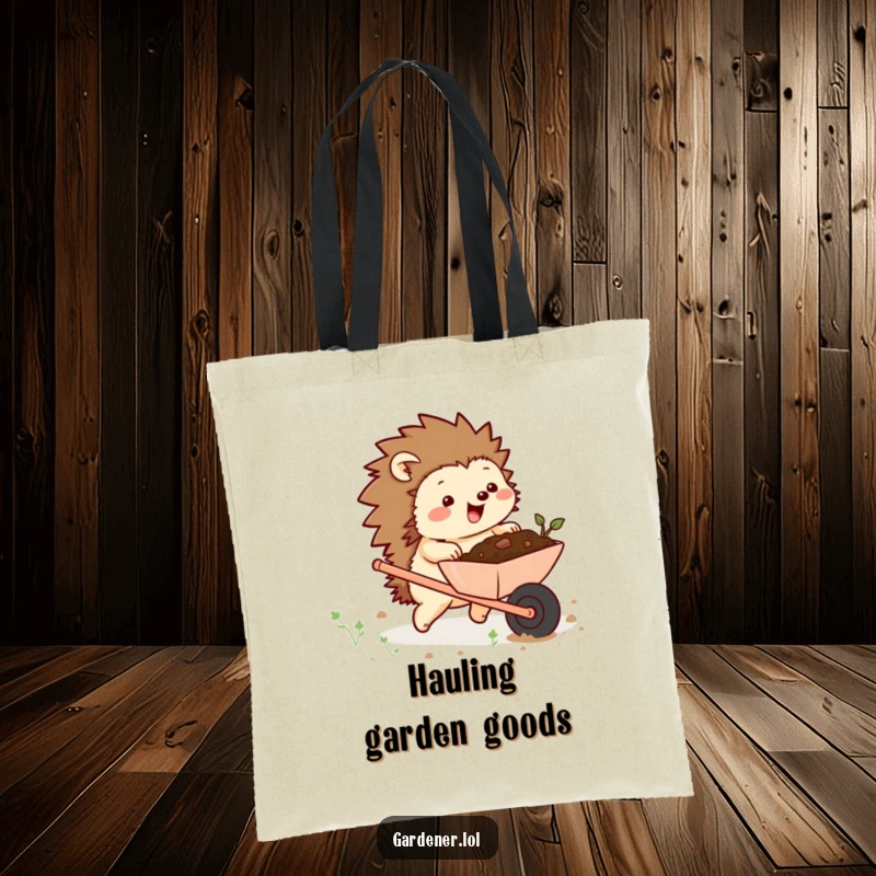 Funny tote bag showing a chubby hedgehog character excitedly pushing a wheelbarrow full of soil, great for shopping with garden humor.